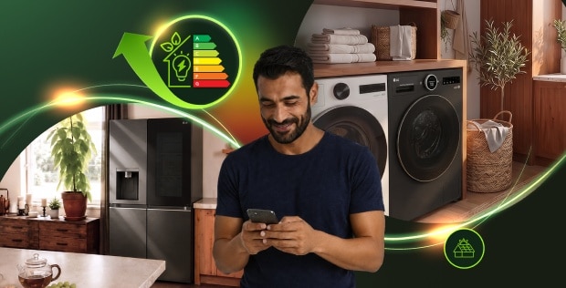 Mann nutzt ein Smartphone in einer modernen Waschküche mit LG Waschmaschine, Trockner und Kühlschrank, umgeben von leuchtenden Energieeffizienz-Grafiken.