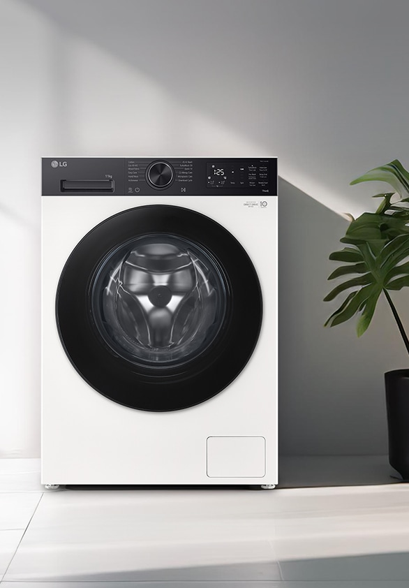 Frontlader-Waschmaschine in einem modernen Waschraum.	