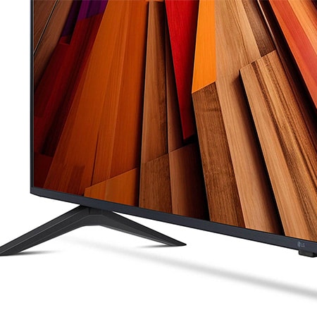 Vergrößerte Ansicht des rechten Standfußes und unteren Rahmens des LG UHD AI ThinQ 4K UT80 Smart TV.