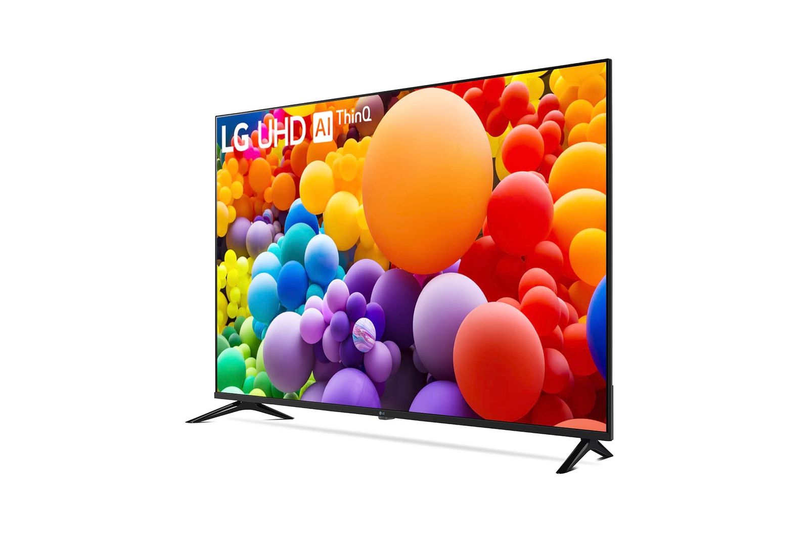 Linke schräge Frontansicht des LG UHD AI ThinQ 4K UT73 Smart TV mit bunter Benutzeroberfläche.