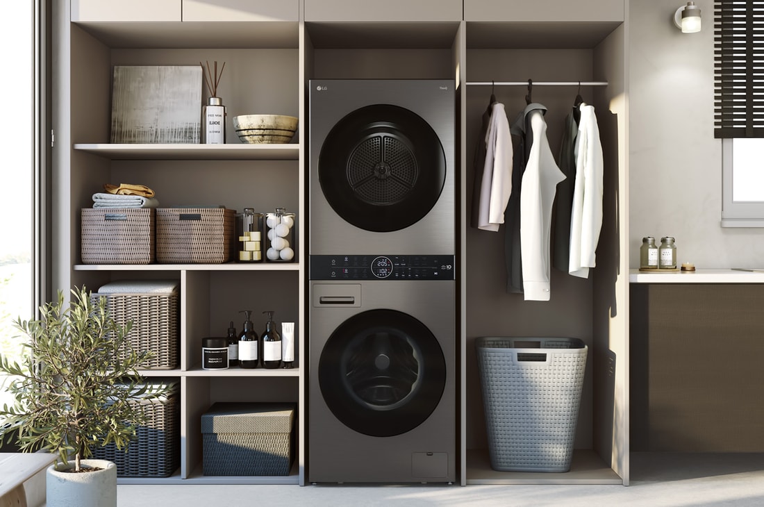 Der LG WashTower WT1210BBF in Schwarz, mit seinem platzsparenden Design in einem modernen Wäscheschrank installiert, mit Energieeffizienzklasse A (Waschmaschine).