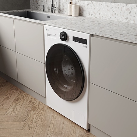Die weiße LG 8 kg Waschmaschine F4WX808YC, installiert in einer modernen Küche, um ihr schlankes, integriertes Design zu zeigen, mit Energieeffizienzklasse A-20%.