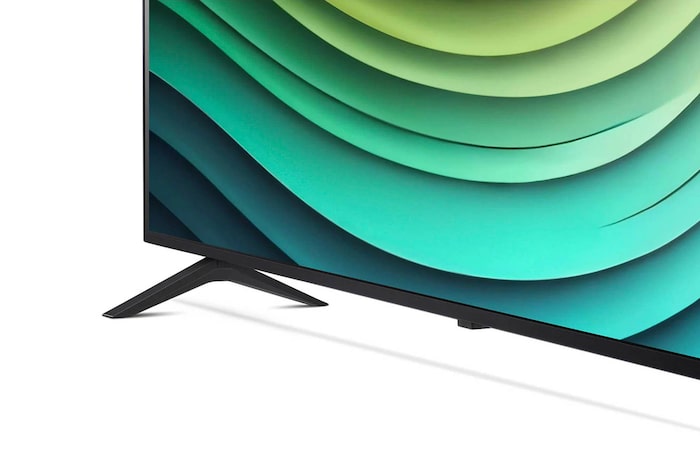 Detailansicht des Standfußes und unteren Rahmens des LG NanoCell AI NANO81 4K Smart TVs mit abstraktem grünem Muster auf dem Bildschirm.