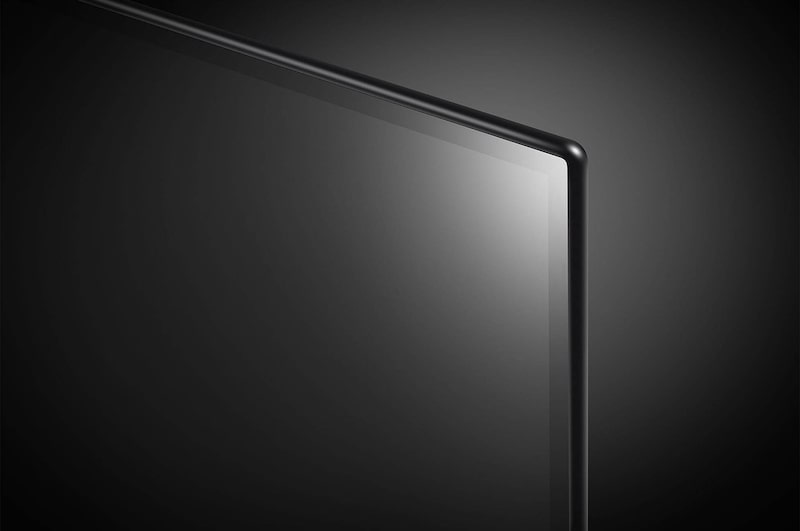 Nahaufnahme der oberen rechten Bildschirm-Ecke des LG OLED AI B4 4K Smart TV mit ultradünner Blende und glänzender Oberfläche.