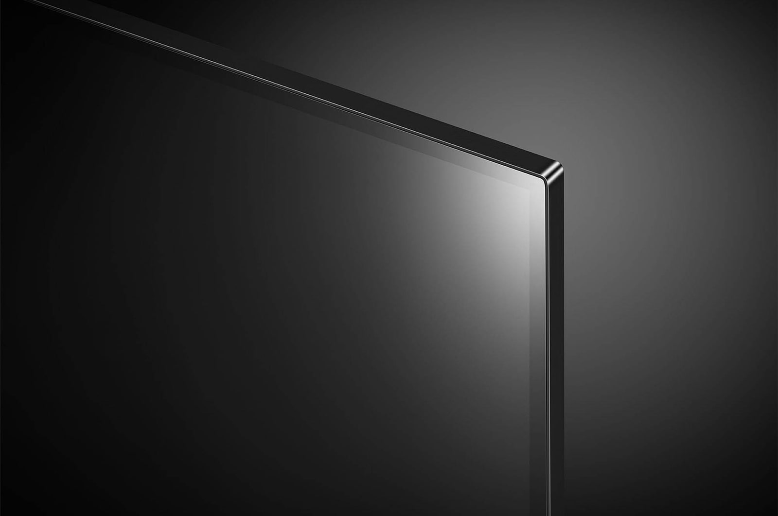 Nahaufnahme der oberen rechten Bildschirm-Ecke des LG OLED AI B4 4K Smart TV mit ultradünner Blende und glänzender Oberfläche.