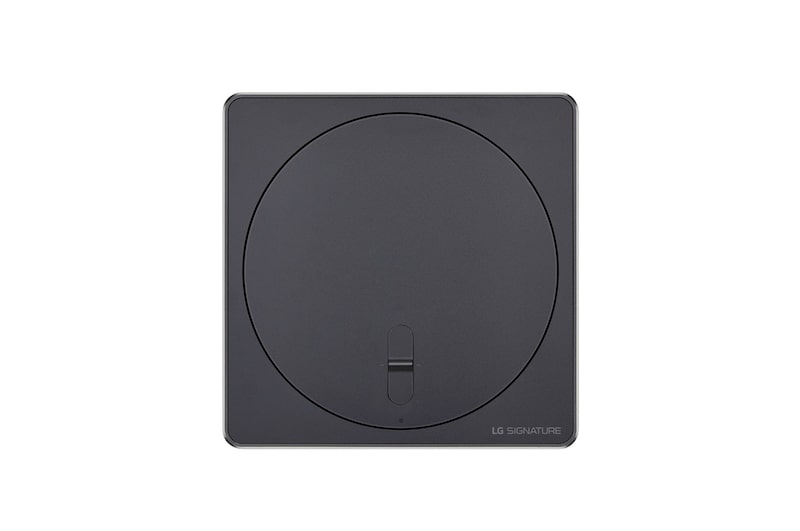 Draufsicht auf die Zero Connect Box für den LG Signature OLED M4 True Wireless TV Fernseher mit kreisförmigem Oberflächendesign.