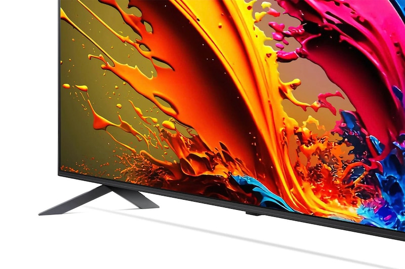Nahaufnahme des zentralen Standfußes und des unteren Rahmendesigns des LG QNED MiniLED AI QNED85 4K Smart Fernsehers.