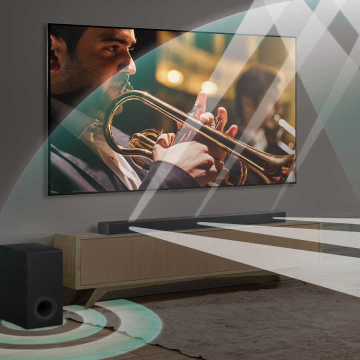 Eine LG Soundbar, LG TV und ein Subwoofer stehen in einer modernen Stadtwohnung. Die LG Soundbar sendet drei Verzweigungen von Schallwellen aus, die aus weißen Tröpfchen bestehen, die auf dem Boden schweben. Neben der Soundbar befindet sich ein Subwoofer, der einen Klangeffekt von unten erzeugt.	