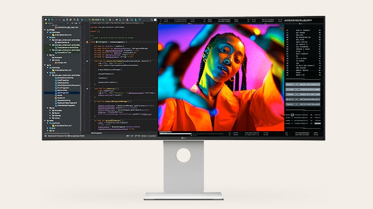 LG UltraFine Monitor mit VESA DisplayHDR 600, der lebendige Farben und tiefen Kontrast über ein Porträtbild und eine Codierungsschnittstelle anzeigt.