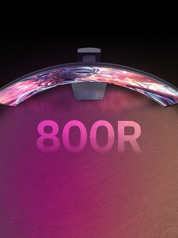 LG Curved Monitor auf dem Schreibtisch illustriert immersive Krümmung für weites Sichtfeld.