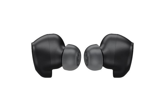 The two earbud tips are facing each other.