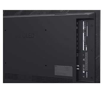 Bred visning af en stilfuld og farverig stue. LG OLED evo AI C5 4K Smart TV er monteret på væggen med en LG Soundbar nedenunder. Fjernsynets design passer godt til rummet. På fjernsynsskærmen vises et farverigt kunstværk. 