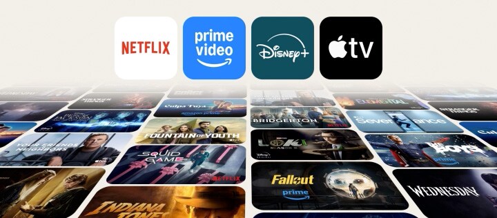 En animeret sekvens viser logoerne for Netflix, Prime Video, Disney+ og Apple TV+, som svæver over en dynamisk collage af populære tv-shows, hvilket fremhæver adgangen fra et LG smart-tv til globale streaming-platforme og fordybende oplevelser.