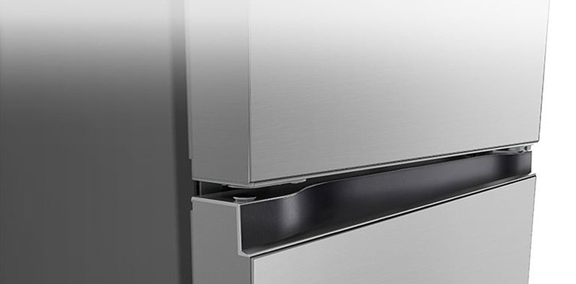 Nærbillede af firkantet håndtag med et elegant og minimalt design.