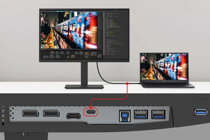 Et billede af en bærbar computer og en skærm, som er forbundet med et enkelt USB Type-C-kabel.	