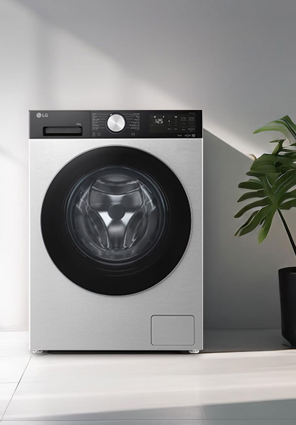 غسالة أمامية التحميل موضوعة في مساحة غسيل حديثة