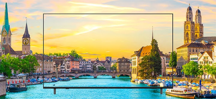 The scenery displayed on the TV screen is vividly rendered, appearing as if it were real.