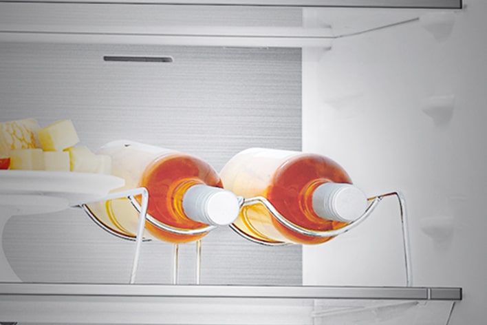 Close-up of wine stand with 2 bottles, enabling efficient use of space.