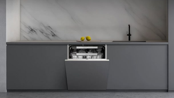 LG Integrated Dishwasher with cabinet panel shown open, revealing interior racks with dishes in a gray kitchen.