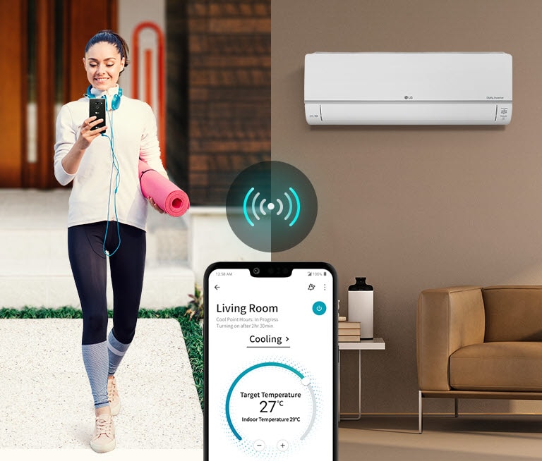 Woman holding a yoga mat controls an LG air conditioner with a smartphone app in a cozy living room.