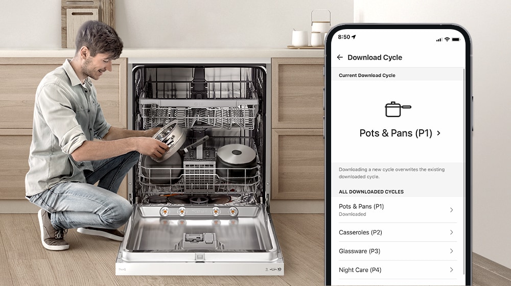 A man is holding a pot next to a dishwasher while a smartphone displays a pots cycle on the ThinQ™ app.