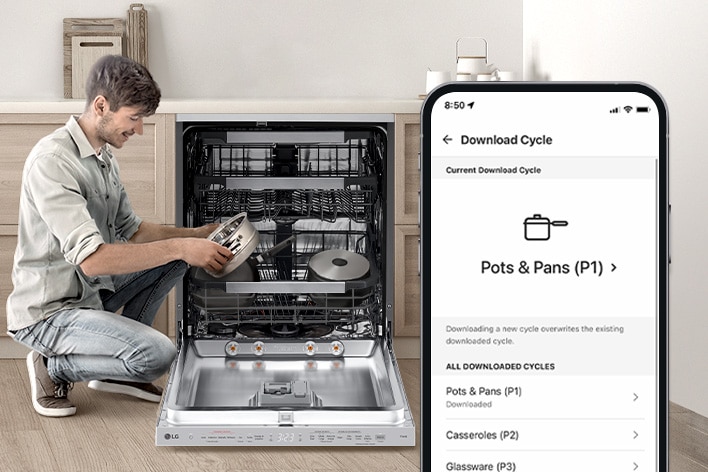 A man is holding a pot next to a dishwasher while a smartphone displays a pots cycle on the ThinQ™ app. 