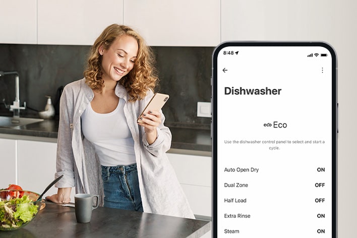 Spatulas, spoons, forks, and knives on the 3rd rack of an LG free-standing dishwasher for organized and efficient cleaning.	