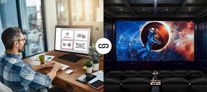 Movie theater manager is simply adjusting movie theater screen settings in the office.
