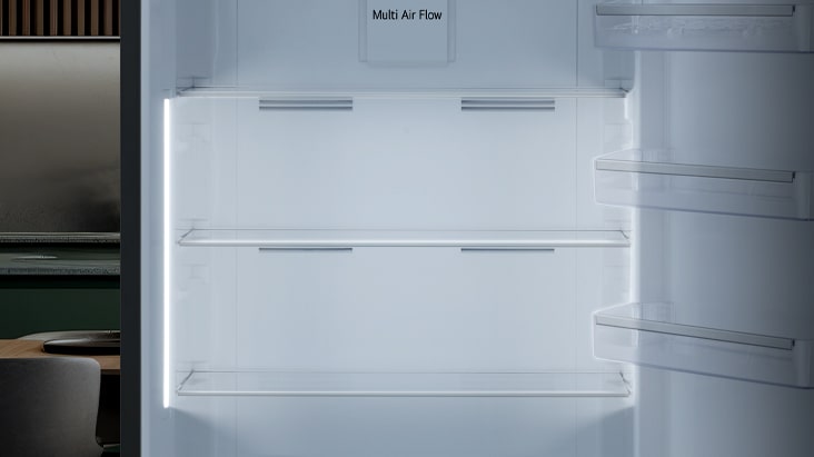 Interior view of fridge with bright LED lighting on both sides for easy visibility and item access.