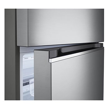 detail view of bottom fridge handle