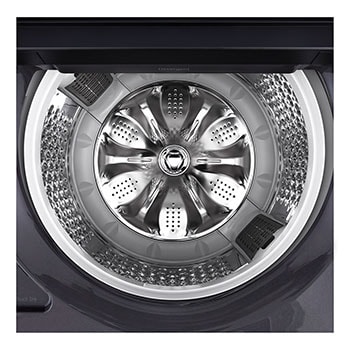 Top loading washing machine with lid in motion, showing soft closing door function.