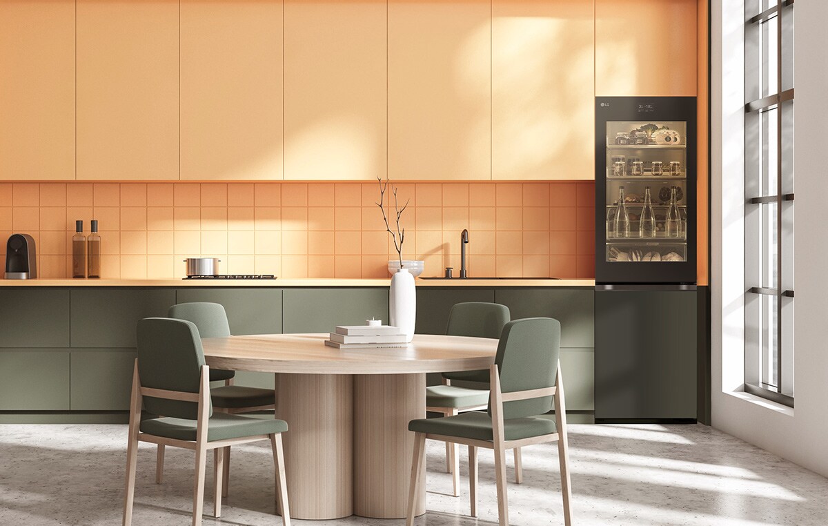 An image of a refrigerator placed in a yellow-toned kitchen.