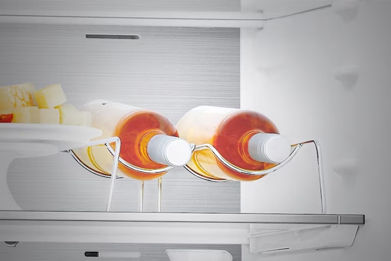 Close-up of wine stand with 2 bottles, enabling efficient use of space.