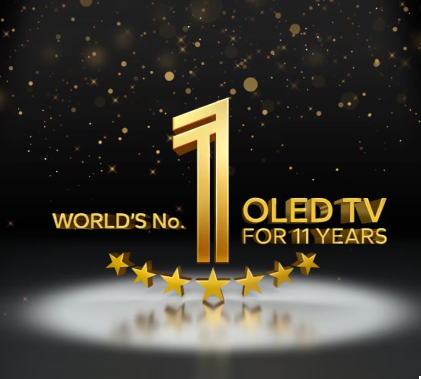 "Un emblema dorado del televisor OLED número 1 del mundo tras 11 años, ante un fondo negro. Sobre el emblema incide la luz de un foco y estrellas doradas abstractas llenan el cielo sobre él.	"
