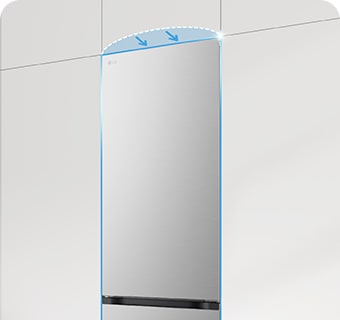 Frigorífico de puerta plana integrado en los armarios de la cocina, completando el aspecto de la cocina sin juntas.