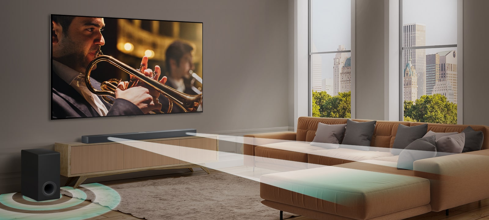 Una barra de sonido LG, un televisor LG y un subwoofer se encuentran en un moderno apartamento urbano. La barra de sonido LG emite tres ramificaciones de ondas sonoras, formadas por gotitas blancas que flotan a lo largo de la parte inferior del suelo. Más ondas sonoras de gotitas blancas se disparan desde la parte superior de la barra de sonido. Junto a la barra de sonido hay un subwoofer, que crea un efecto de sonido desde la parte inferior. En conjunto, crean un efecto de cúpula en toda la habitación.