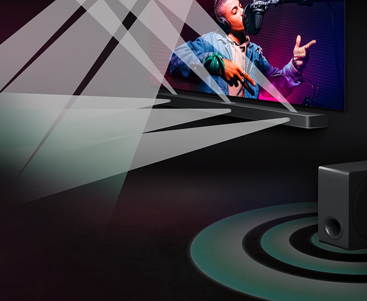 Un televisor LG y una barra de sonido LG en una habitación oscura reproducen una actuación musical. Unas gotas blancas que representan ondas sonoras se disparan hacia arriba y hacia delante desde la barra de sonido. Un subwoofer crea un efecto de sonido desde la parte inferior.