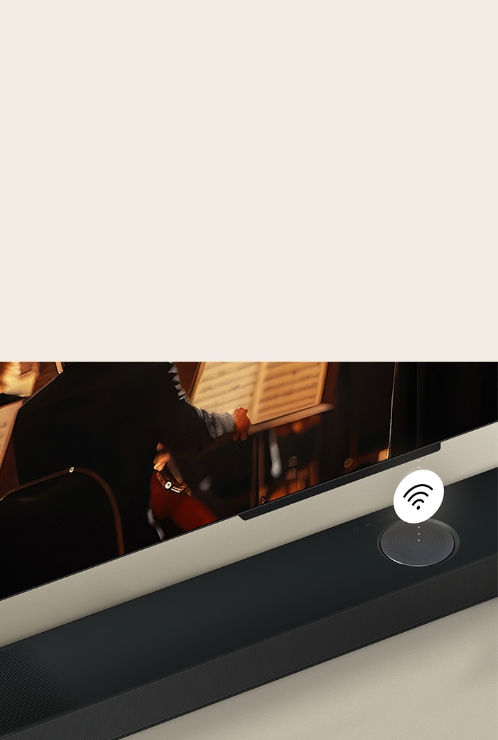 Primer plano de un LG TV sobre una LG Soundbar con un símbolo Wi-Fi flotando encima.
