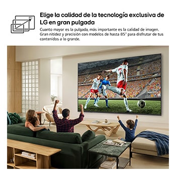 LG QNED evo AI QNED82 Mini LED Ultra Big TV shows an intense, large-scale soccer play with refined picture quality and vivid colors as a family cheers together from sofas in a living room.