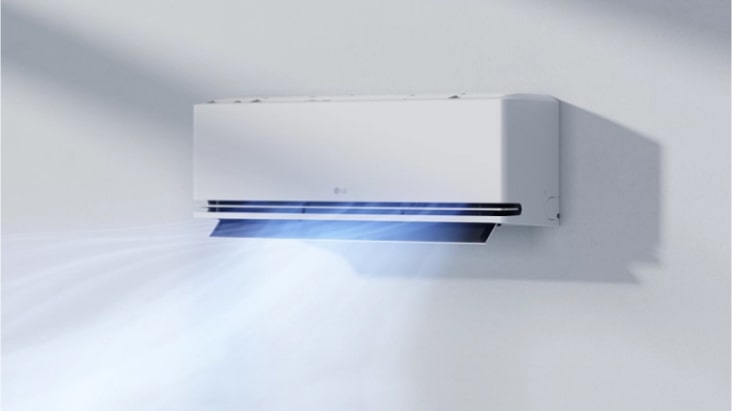 El aire acondicionado LG proporciona un flujo de aire suave y delicado en un salón moderno para crear un ambiente confortable.