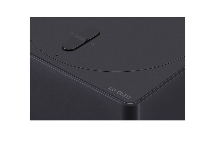 Gros plan légèrement incliné du boîtier Zero Connect Box avec le logo LG OLED sur le bord