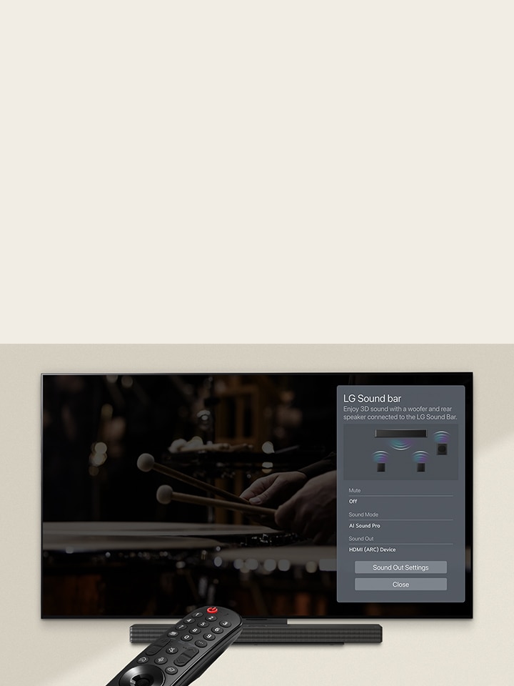 Une télécommande pointée vers un TV OLED LG*, montrant les paramètres sur la droite de l’écran.