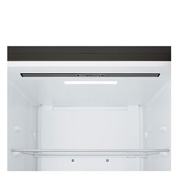 LG fridge freezer (GBBS726CEV) built into dark brown cabinetry with window and sofa on left and sink on right