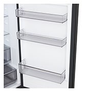 LG fridge freezer (GBBSJ10DEP) built into dark brown cabinetry with window and sofa on left and sink on right