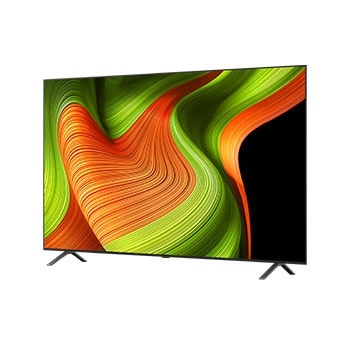 Espace salon avec une LG OLED TV à fixation murale. Sur la TV se trouve une chaîne de montagnes face à un ciel sombre et nocturne rempli d’étoiles. Cette scène est divisée en deux pour montrer comment le Noir Absolu offre des niveaux de noir intense, dans un espace lumineux ou sombre. Un côté montre la scène dans une version plus terne et plus grise du paysage étiquetée, Noir. De l’autre côté se trouve une image plus agréable avec une gamme dynamique élargie de noirs et de blancs. L’écran est étiqueté Noir Absolu. La certification du logo est également visible, la technologie Noir Absolu offre des niveaux de noir inférieurs ou égaux à 0,24 nit et jusqu’à 500 lux. Une bulle de texte est à côté, qui dit : vérifiez le logo de certification Noir Absolu.