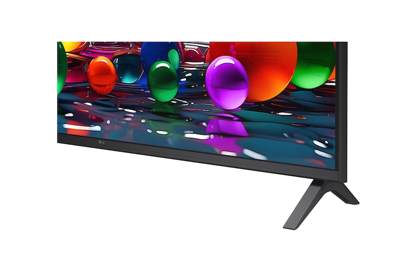 LG TV avec un écran d’une taille impressionnante fixé sur un mur au-dessus d’une LG Soundbar dans un salon au style moderne.