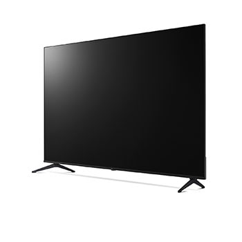 LG TV avec un écran d’une taille impressionnante fixé sur un mur au-dessus d’une LG Soundbar dans un salon au style moderne.