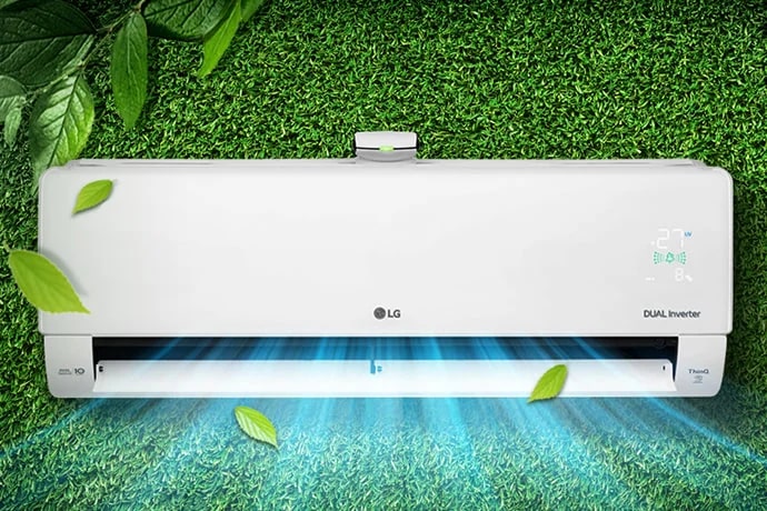 an air conditioner that breathes cool air on green grass