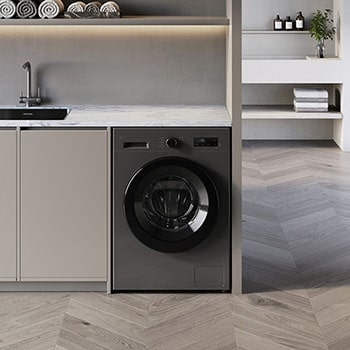 Lave-linge séchant LG F94B15MBS blanc installé sous un plan de travail moderne, doté d'un hublot noir élégant.