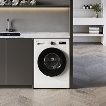 Lave-linge séchant LG F854B16WHS blanc installé sous un plan de travail moderne, doté d'un hublot noir élégant contrastant.